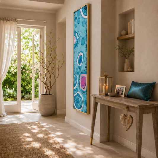 Long blue and pink colourful hallway art print Dare to be Different in turquoise and pink, hanging in a warm narrow hallway