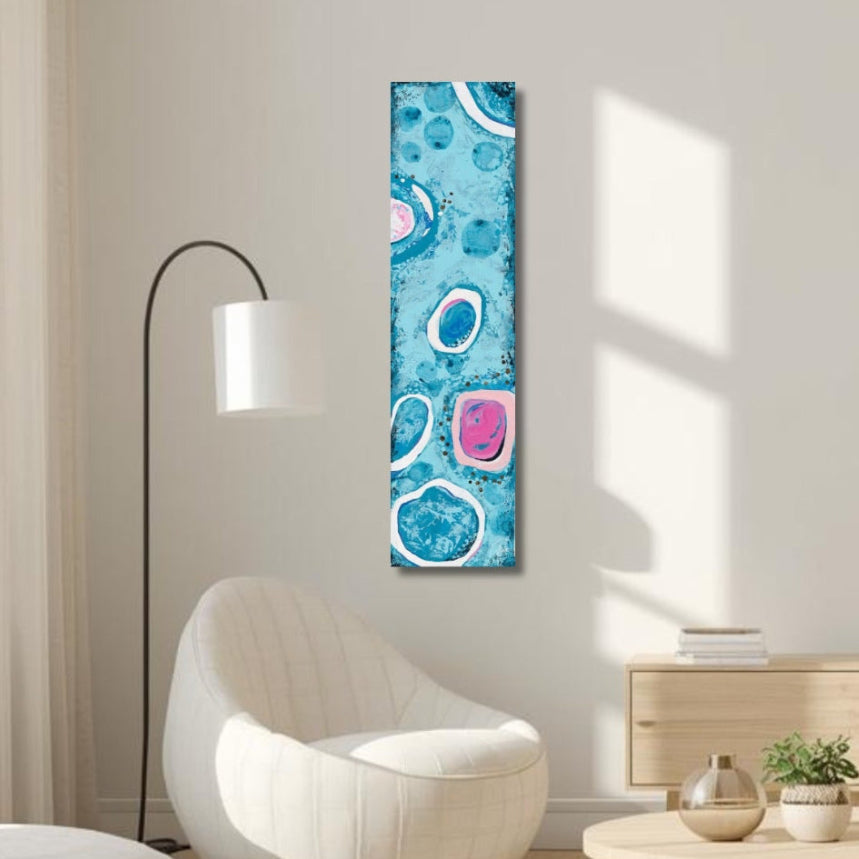 Abstract art piece on a wall in a modern living room