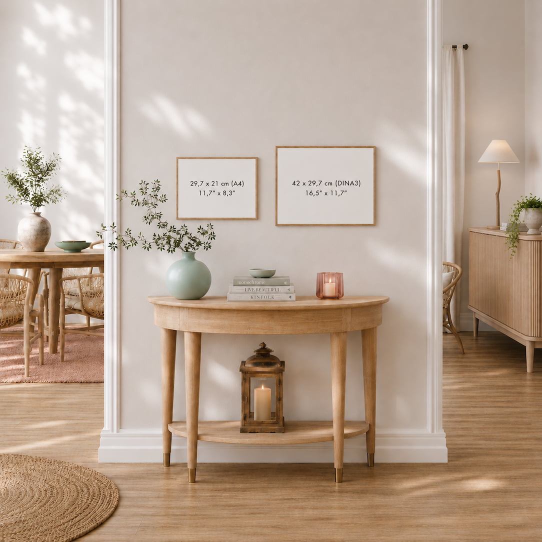 Wall art print size guide showing A4 and A3 formats on a wall above a timber console table in a warm neutral Australian interior